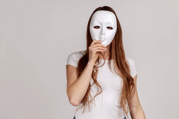 Portrait Anonymous Dark Haired Woman Covering Her Face White Mask — Fotografia de Stock