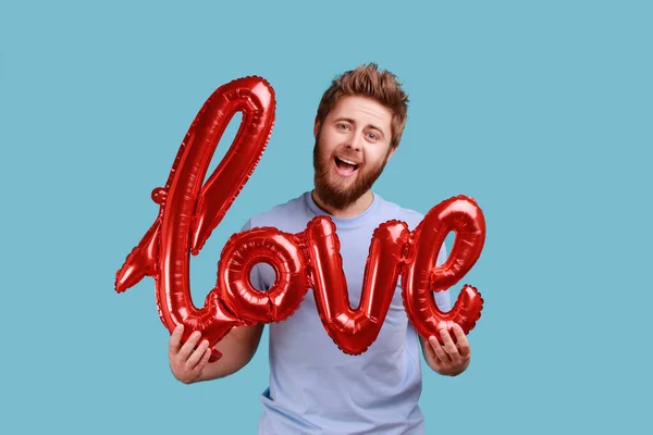 Portrait Romantic Bearded Man Holding Love Word Foil Balloons Expressing — Stock Fotó