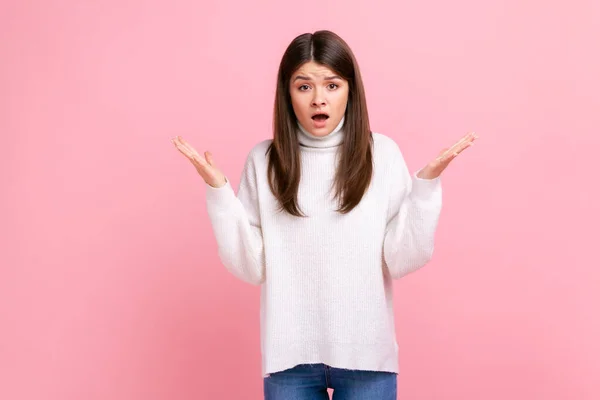 Brunette Woman Raising Hands Looking Confused Expression Quarreling Annoyed Conflict – stockfoto