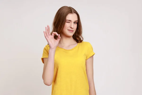 Portrait Satisfied Young Woman Brown Wavy Hair Casual Yellow Shirt — Foto de Stock