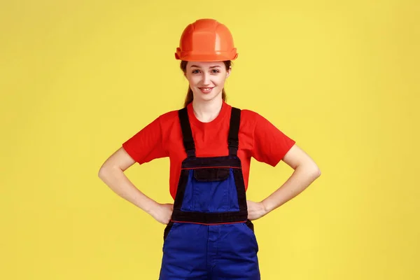 Portrait Happy Confident Builder Woman Standing Holding Hands Hips Looking — Stock Fotó