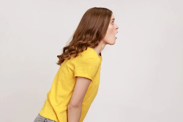 Side View Shocked Beautiful Young Girl Brown Golvy Hair Yellow — Stockfoto
