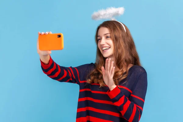 Friendly Woman Wearing Striped Casual Style Sweater Nimb Head Holding — Stock Photo, Image