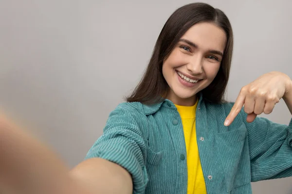 Delighted Happy Woman Dark Hair Making Selfie Pointing Finger Asking — Stock Photo, Image