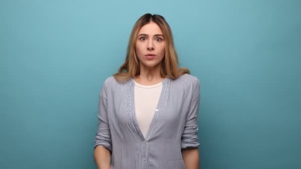 Portrai Tof Young Adult Woman Wavy Hair Covering Mouth Palm — Stock Video