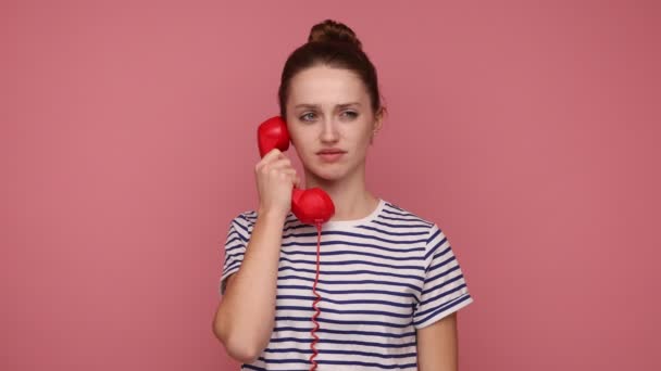 Angry Displeased Young Woman Loudly Screaming Holding Hand Red Landline — Stock Video