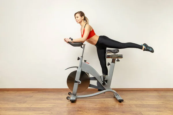 Side View Portrait Slim Attractive Woman Standing Exercise Bike Raised — Stock Photo, Image