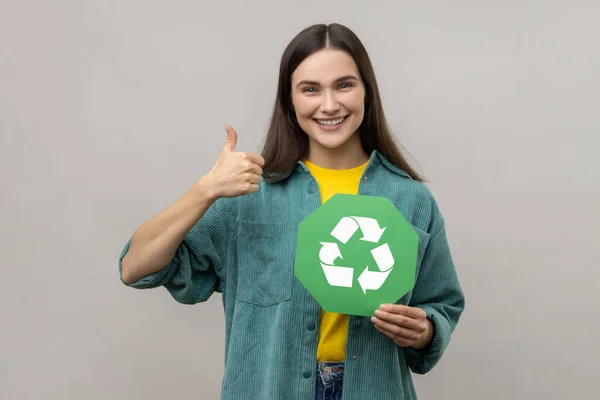 Satisfied Smiling Woman Showing Thumbs Gesture Holding Green Symbol Sorting — ストック写真