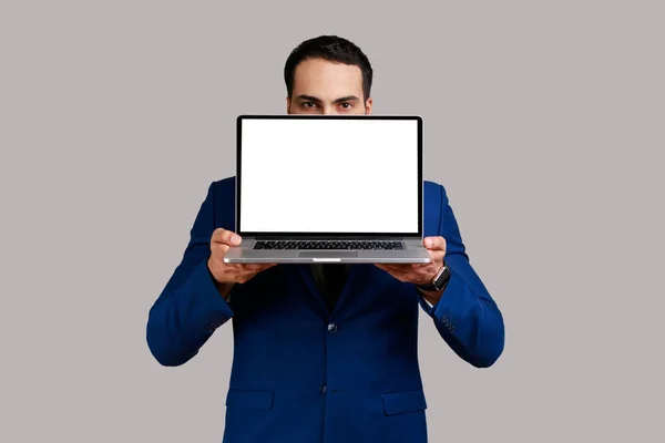 Bearded Businessman Covering Half Face Laptop Empty Display Advertisement Promotional — Stock Photo, Image