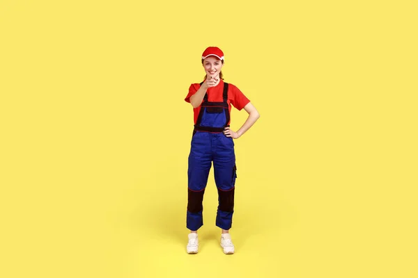 Full Length Portrait Smiling Satisfied Woman Worker Standing Pointing Finger — Foto de Stock