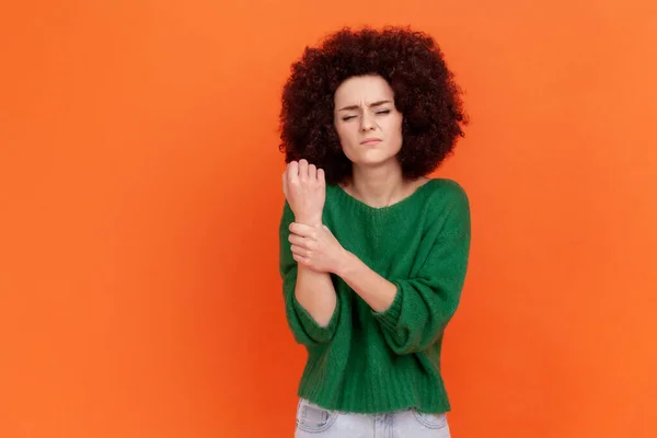 Sad Woman Afro Hairstyle Wearing Green Casual Style Sweater Injured — стокове фото