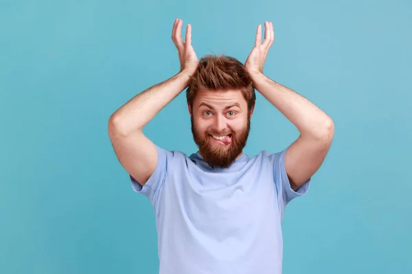 Portrait Positive Bearded Man Standing Antler Horns Head Showing Tongue — Zdjęcie stockowe