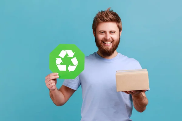 Portrait Smiling Handsome Optimistic Bearded Man Holding Green Recycling Sign — Stockfoto