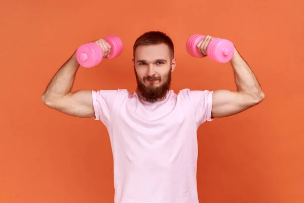 Portrait Strong Athletic Handsome Young Bearded Man Holding Rose Dumbbells — Stockfoto