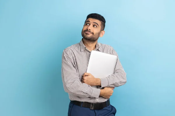 Portrait Pensive Businessman Standing Holding Closed Laptop Folder Looking Away — Foto Stock