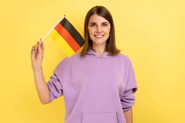 Portrait Satisfied Smiling Young Adult Woman Standing Waving German Flag — стоковое фото