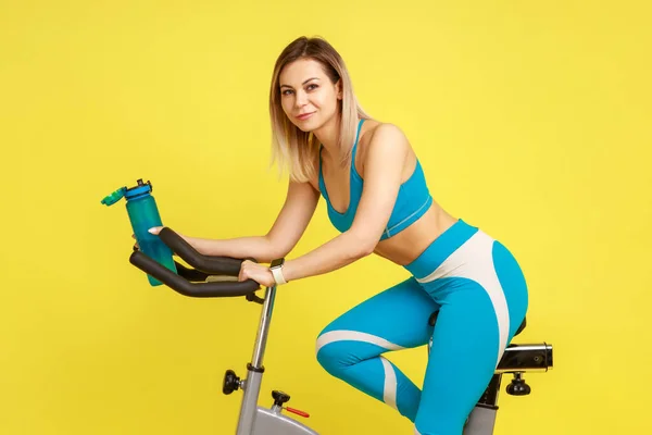 Side View Portrait Blonde Athletic Woman Exercise Bike Bottle Water — Stockfoto