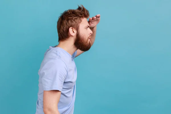 Side View Serious Concentrated Bearded Man Looking Far Away Distance — Stockfoto