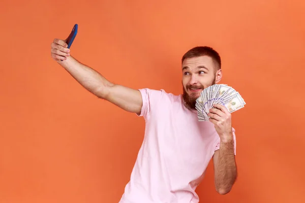 Portrait Positive Bearded Man Making Selfie Photo Bunch Dollars Smartphone — Foto de Stock