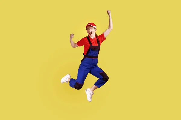 Full Length Portrait Extremely Happy Worker Woman Jumping Clenched Fists — 图库照片