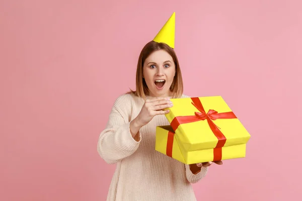 Portrait Excited Astonished Blond Woman Party Cone Unpacking Present Box — Zdjęcie stockowe