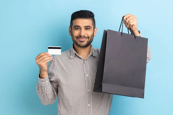 Smiling Businessman Holding Showing Limitless Credit Card Shopping Bags Pleased — Foto de Stock