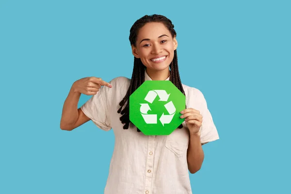Positive Satisfied Woman Black Dreadlocks Pointing Green Recycling Symbol Her — 스톡 사진