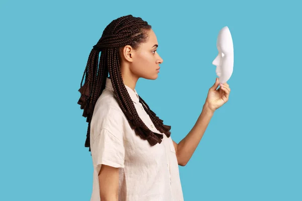 Side View Confident Serious Woman Dreadlocks Holding Looking White Mask — Foto Stock