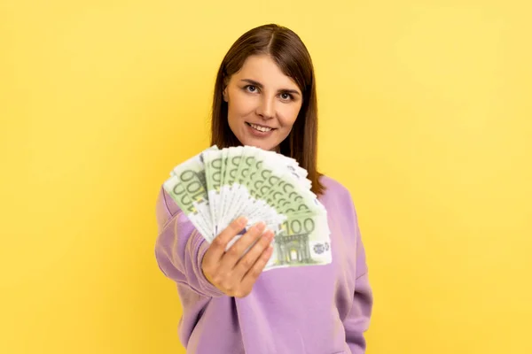 Optimistic Woman Hair Holding Out Big Fan Money Looking Camera — ストック写真