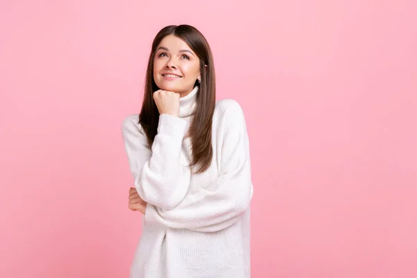 Portrait Happy Positive Female Stands Hand Chin Dreaming Looking Away — Fotografia de Stock