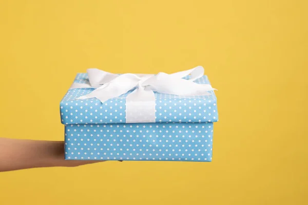 Closeup Side View Woman Hand Holding Out Blue Gift Box — Fotografia de Stock