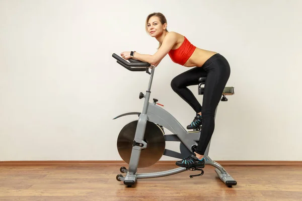 Side View Beautiful Woman Riding Exercise Bike Doing Sports Home — Stock Photo, Image