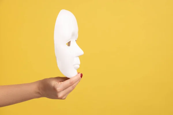 Profile Side View Closeup Woman Hand Holding White Facial Mask - Stock-foto