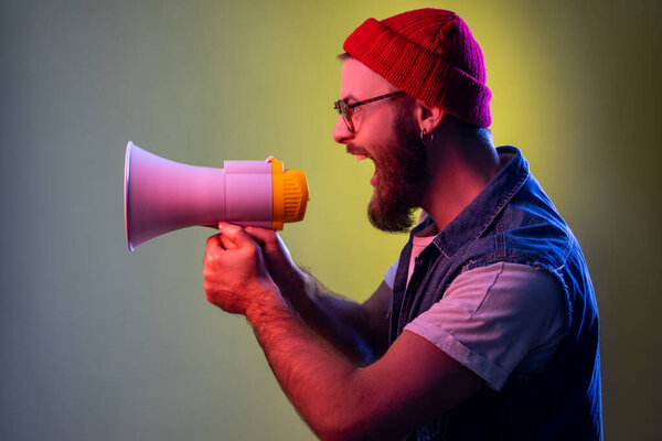 Excited Crazy Bearded Hipster Man Screaming Holding Loudspeaker Megaphone Looking Royalty Free Stock Images