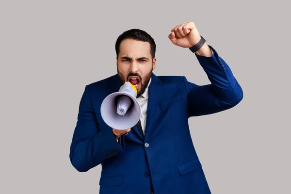Portrait Bearded Businessman Standing Raised Hands Holding Megaphone Screaming Loud — Stock Photo, Image