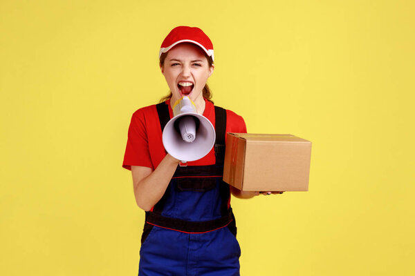 Portrait Angry Courier Woman Holding Cardboard Box Screaming Megaphone Looking Stock Image