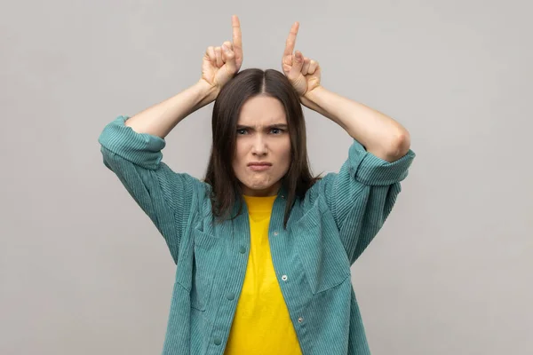 Portrait Aggressive Bully Woman Dark Hair Showing Bull Horns Gesture — Stock Photo, Image