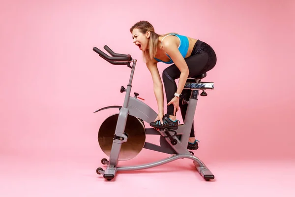 Full Length Portrait Sportswoman Has Workout Home Exercise Bike Warming — Stock Photo, Image