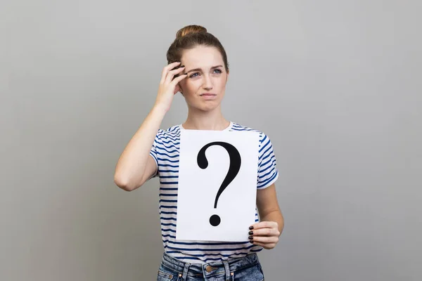 Portrait Pensive Thoughtful Woman Wearing Striped Shirt Looking Away Holding — Foto de Stock