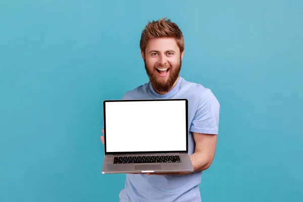 Portrait Bearded Man Holding Showing Laptop Blank Empty Display Place — 图库照片