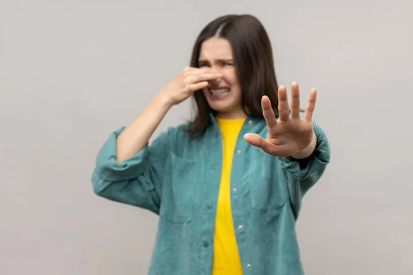 Awful Smell Confused Woman Pinching Her Nose Hold Breath Showing — Stock Photo, Image