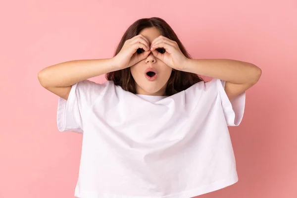 Little Girl Wearing White Shirt Making Glasses Shape Fingers Looking — Stockfoto