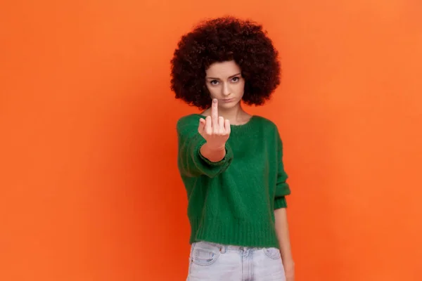 Woman Afro Hairstyle Wearing Green Casual Style Sweater Showing Middle — Fotografia de Stock