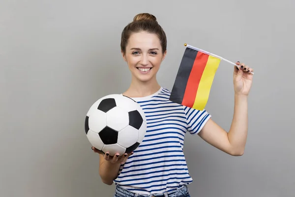Portrait Joyful Cheerful Woman Wearing Striped Shirt Holding Soccer Ball — Foto de Stock