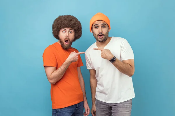 Portrait Two Young Adult Hipster Men Pointing Finger Each Other — Stockfoto