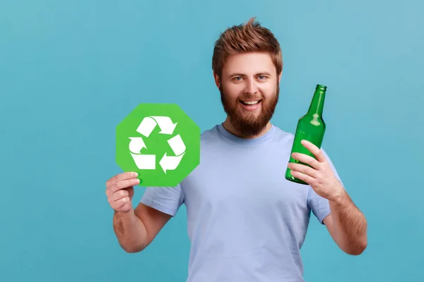 Portrait Smiling Positive Attractive Bearded Man Holding Glass Bottle Recycling — Stockfoto