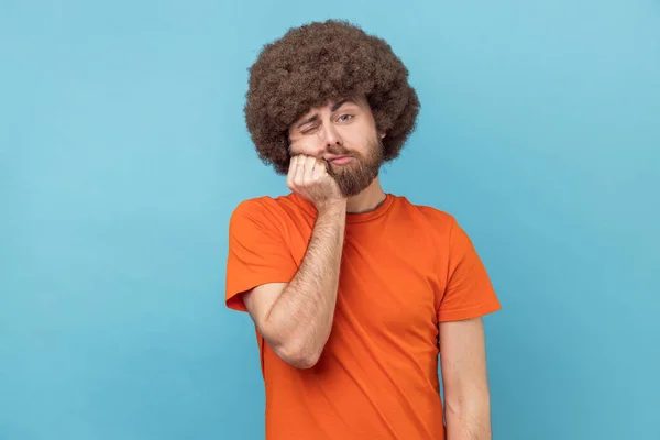 Portrait Man Afro Hairstyle Wearing Orange Shirt Looking Camera Unhappy — Zdjęcie stockowe