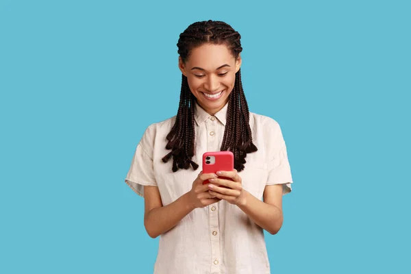 Cheerful Woman Black Dreadlocks Sends Text Messages Mobile Phone Searches — 图库照片