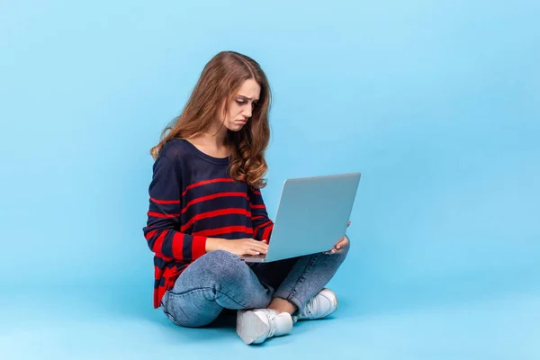 Portrait Upset Woman Wearing Striped Casual Style Sweater Sitting Holding — kuvapankkivalokuva
