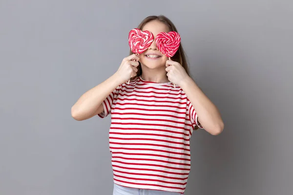 Portrait Smiling Little Girl Wearing Striped Shirt Covering Her Eyes — 스톡 사진